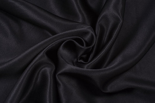 Silk Fabric Types Explained: Charmeuse, Crepe, Satin, and Twill