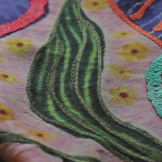 Close up texture of embroided silk cashmere scarf.
